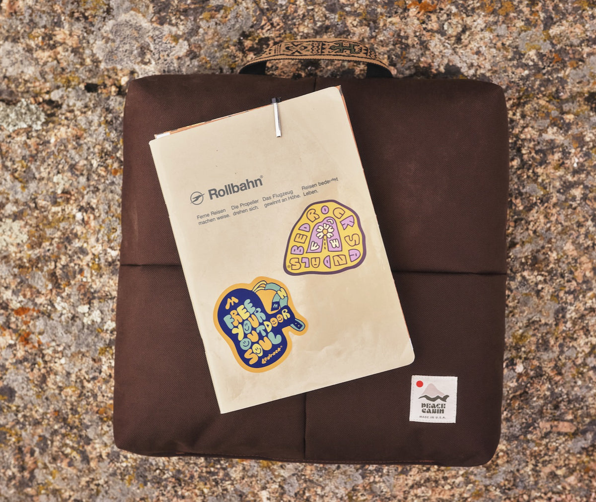 Bedrock die cut stickers stuck on a notebook cover