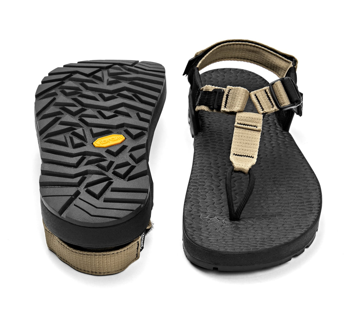 A pair of Cairn Evo C Sandals with bone tan straps and a black rugged sole, including a detailed view of the Vibram XS Trek EVO outsole.