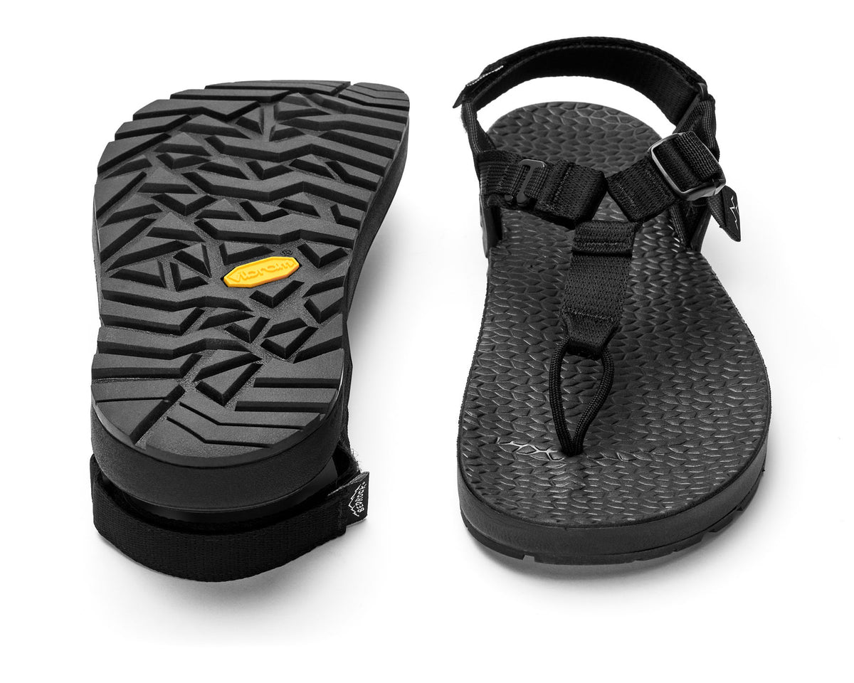 A pair of Cairn Evo C Sandals with black straps and a black rugged sole, including a detailed view of the Vibram XS Trek EVO outsole.