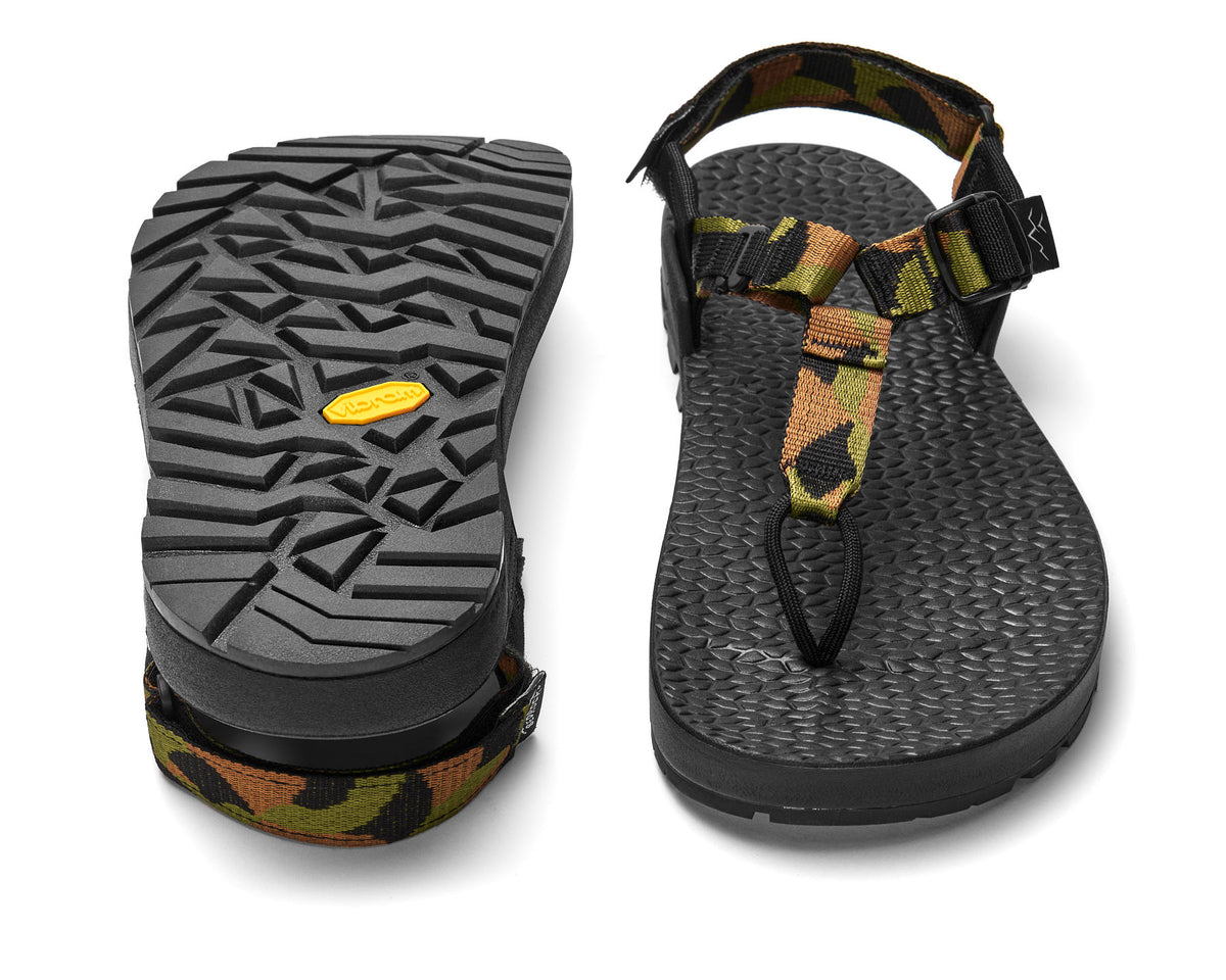A pair of Cairn Evo C Sandals with patterned block landscape straps and a black rugged sole, including a detailed view of the Vibram XS Trek EVO outsole.