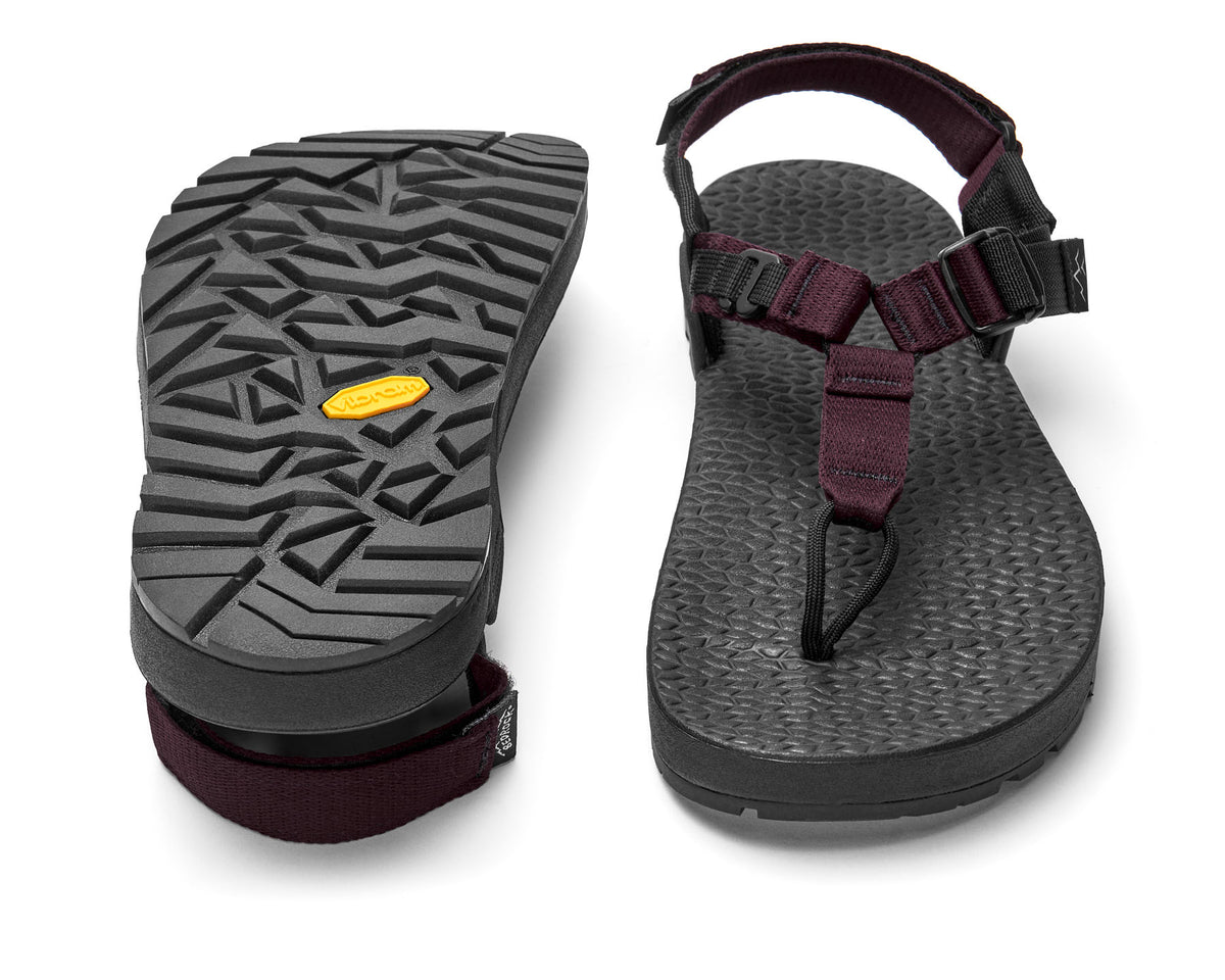 A pair of Cairn Evo C Sandals with burgundy straps and a black rugged sole, including a detailed view of the Vibram XS Trek EVO outsole.