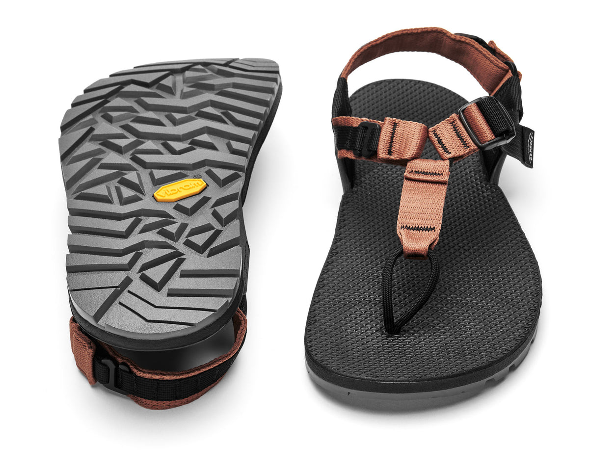 A pair of Cairn Evo PRO Sandals with clay straps and black footbed, featuring a hook-and-loop strap design and Vibram Megarip outsole.