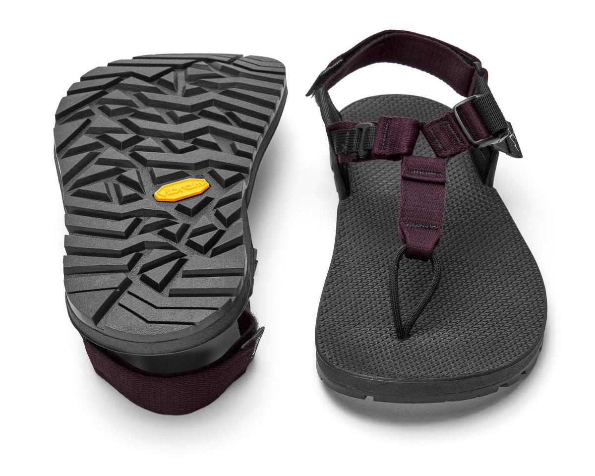 A pair of Cairn Evo Sandals with burgundy straps and rugged Vibram XS Trek Evo sole. 