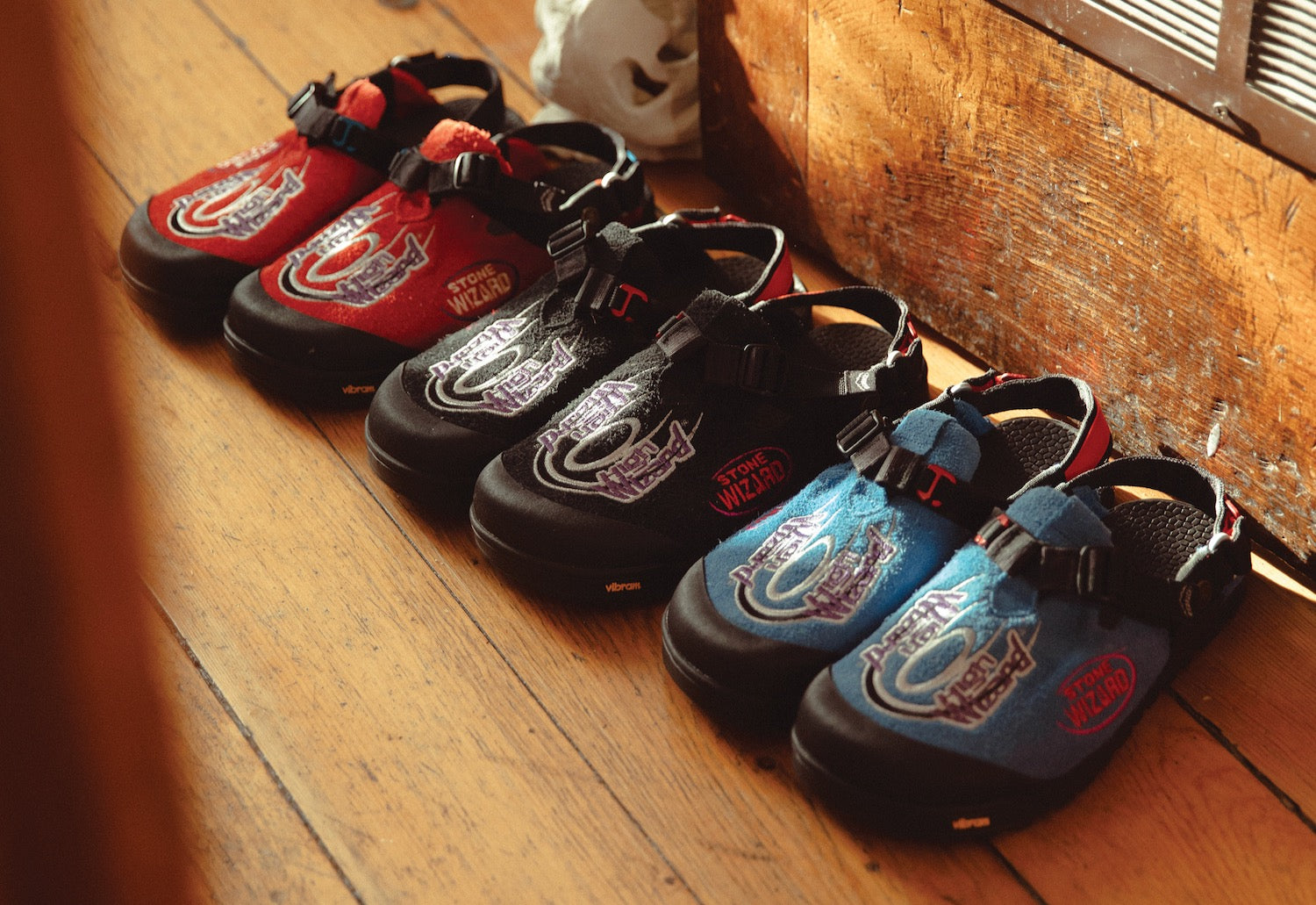 Stone Wizard Mountain Clogs on wood floor
