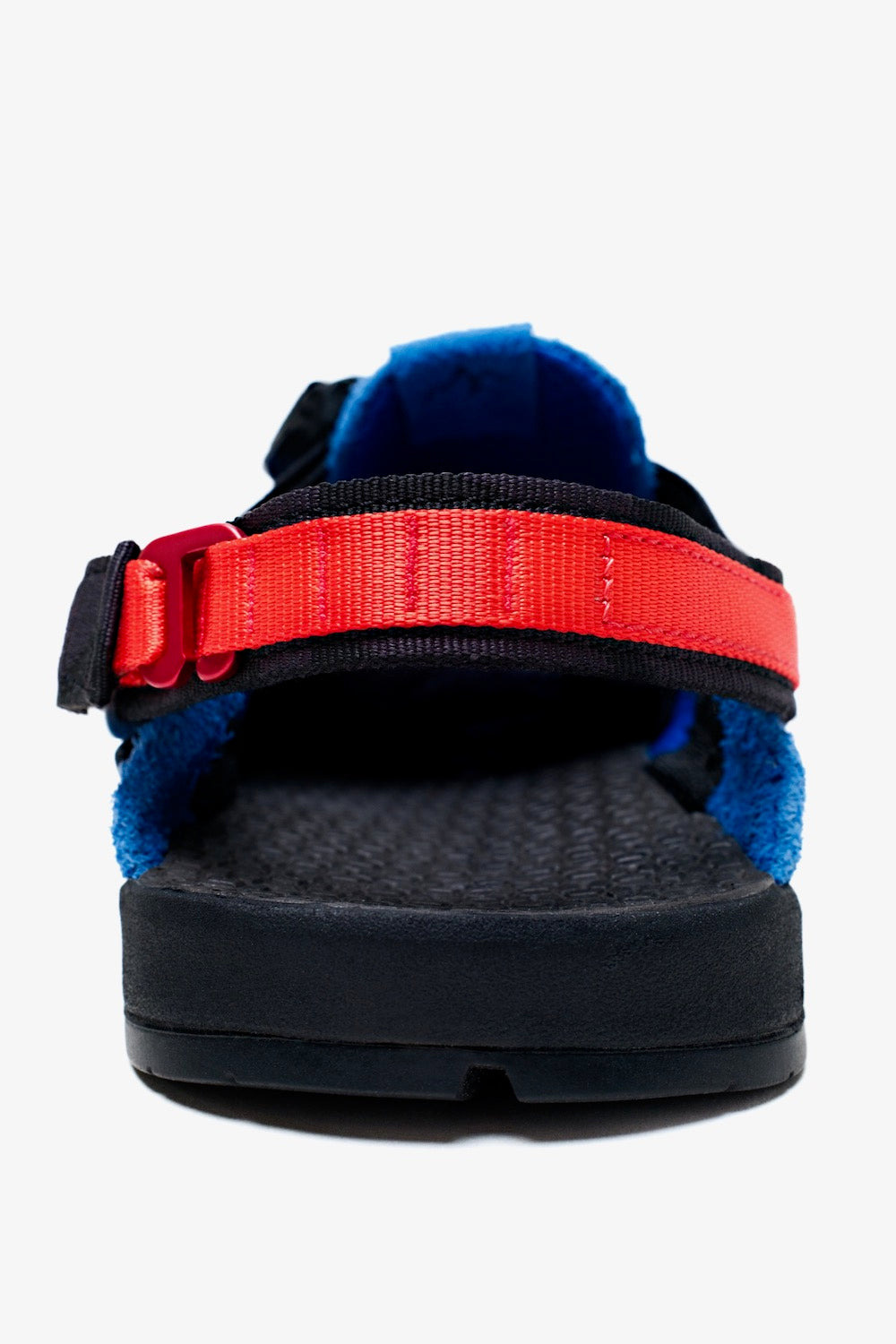 Stone wizard mountain clogs in cyber blue heel view